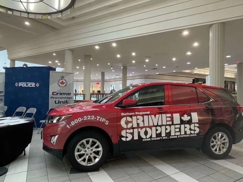 Former Durham Regional Crime Stoppers vehicle at a community display